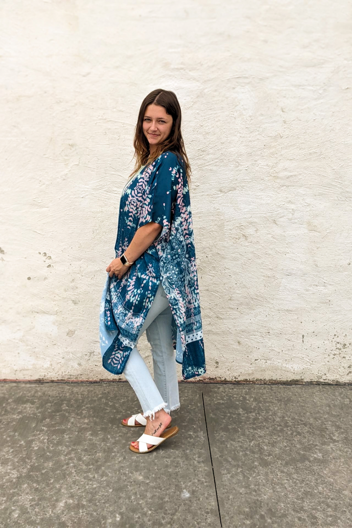 Boho Blue Floral Kimono Shawl with pink, white, green accent colors. Knee length, short sleeves and split sides. 