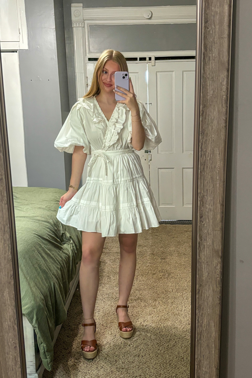 Gorgous Tiered Ruffle Mini Wrap Dress with Puff Mid Length Sleeves. V-neck with ruffles and waist tie. 