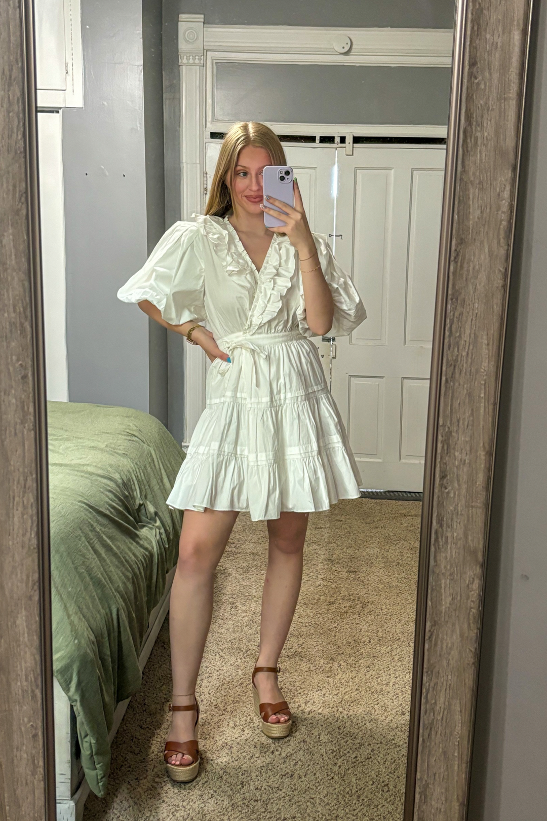 Gorgous Tiered Ruffle Mini Wrap Dress with Puff Mid Length Sleeves. V-neck with ruffles and waist tie. 