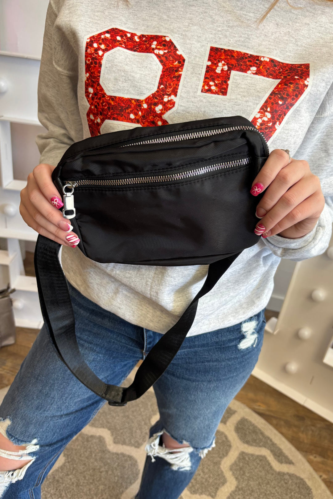 Black Nylon Belt Crossbody Bag with zipper closure and inside mesh compartments/pockets with adjustable strap