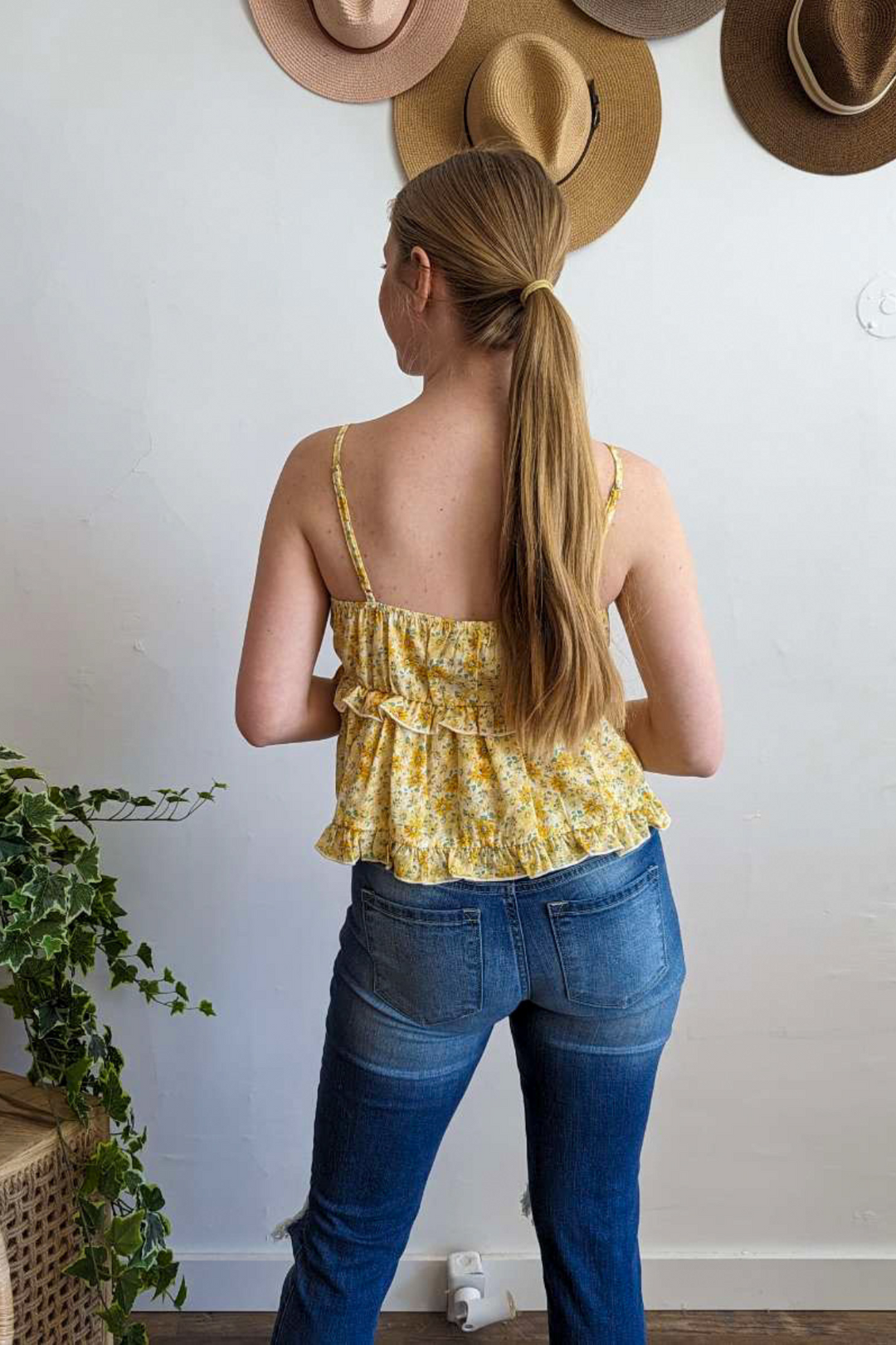 Yellow Floral Spaghetti Strap Top with Ruffles and Decorative Tie Perfect for Summer and Spring with Adjustable Straps.