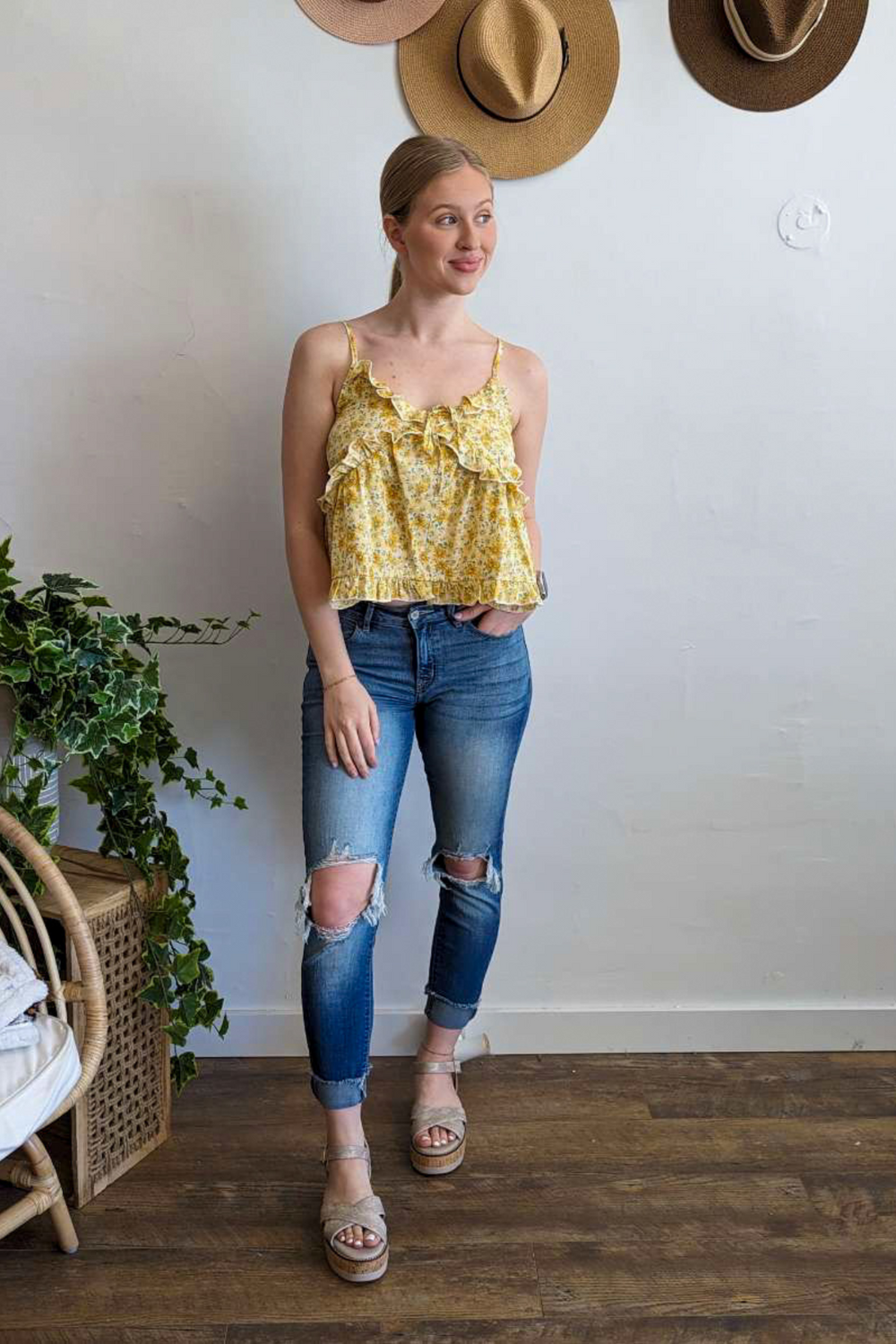 Yellow Floral Spaghetti Strap Top with Ruffles and Decorative Tie Perfect for Summer and Spring with Adjustable Straps.